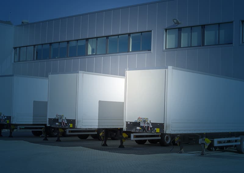 Drop trailers with blue overlay | Retail logistics solution by C.H. Robinson