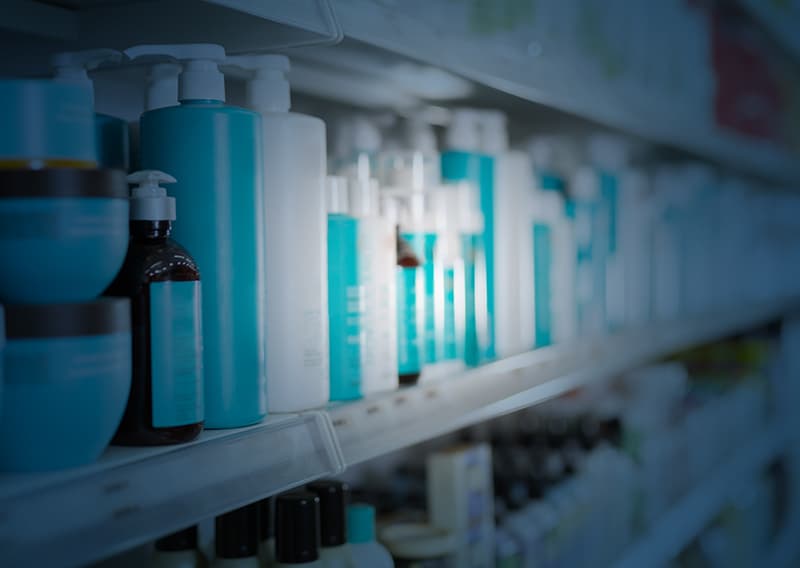 Close up of personal care items with blue overlay | Retail logistics solutions by C.H. Robinson