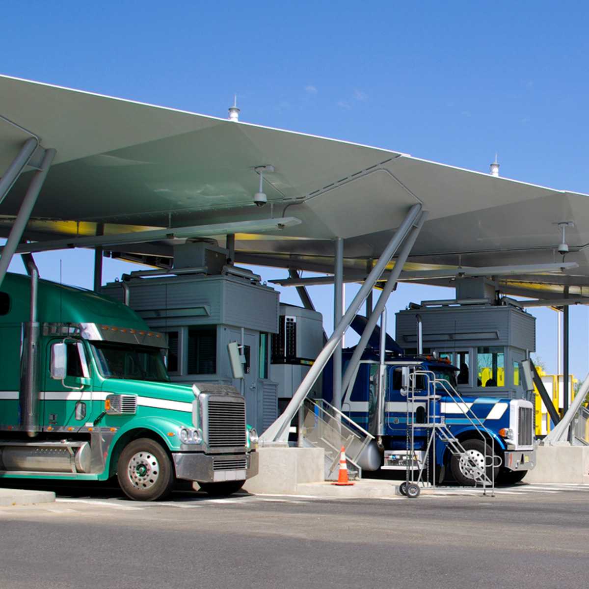 Trucks at border crossing checkpoint.