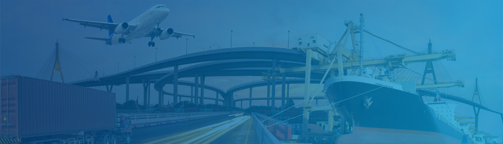 Plane flying over trucks and ships.